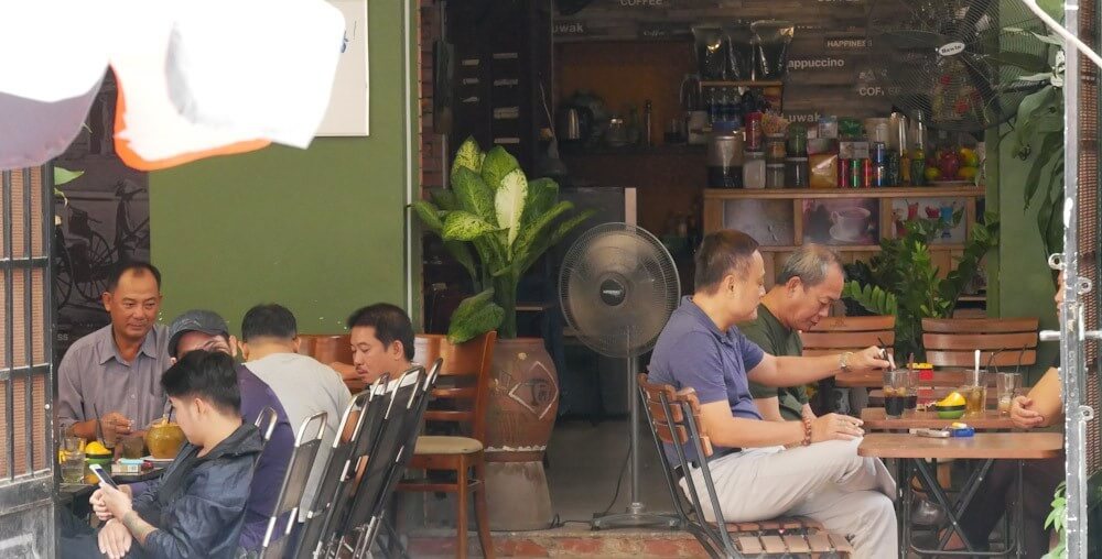 Locals at a cafe in Saigon's airport district. 