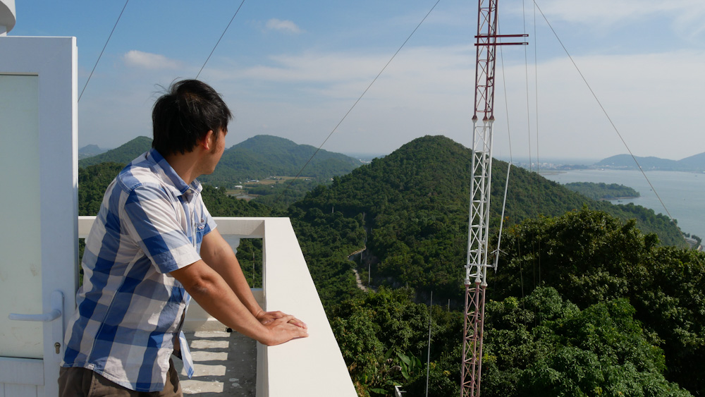 Lighthouse keeper looks out over the limestone hills surrounding the Vietnamese town of Ha Tien. Nui Nai lighthouse, 2018. 