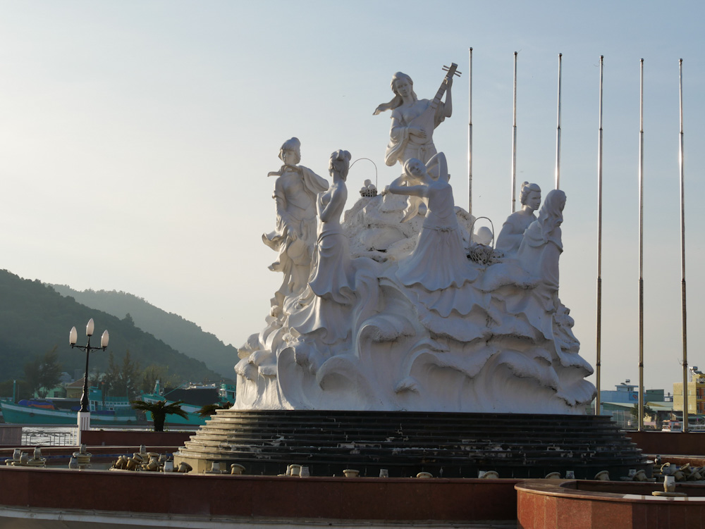 Water fairies statue at Ha Tien, just as evening descends on the waterfront. 