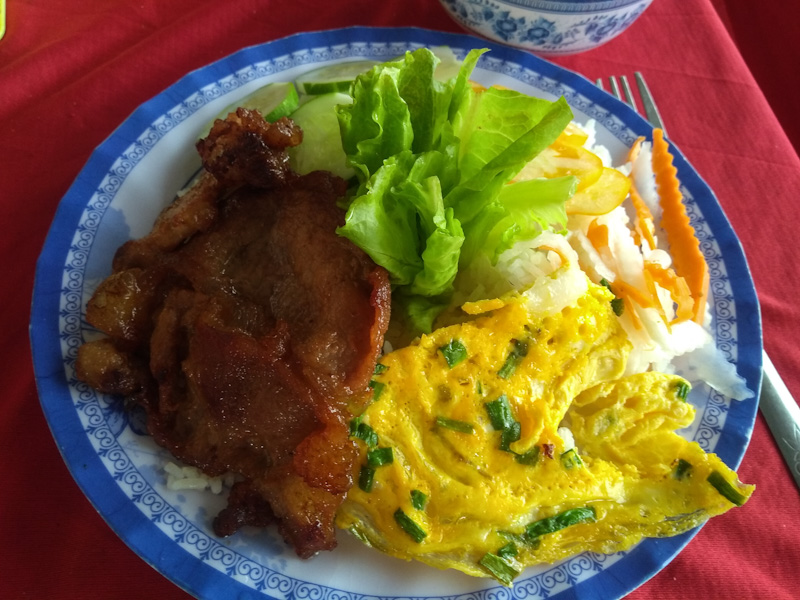 A Com Tam (broken rice) meal near the Linh Tu pagoda complex near Sa Dec. 