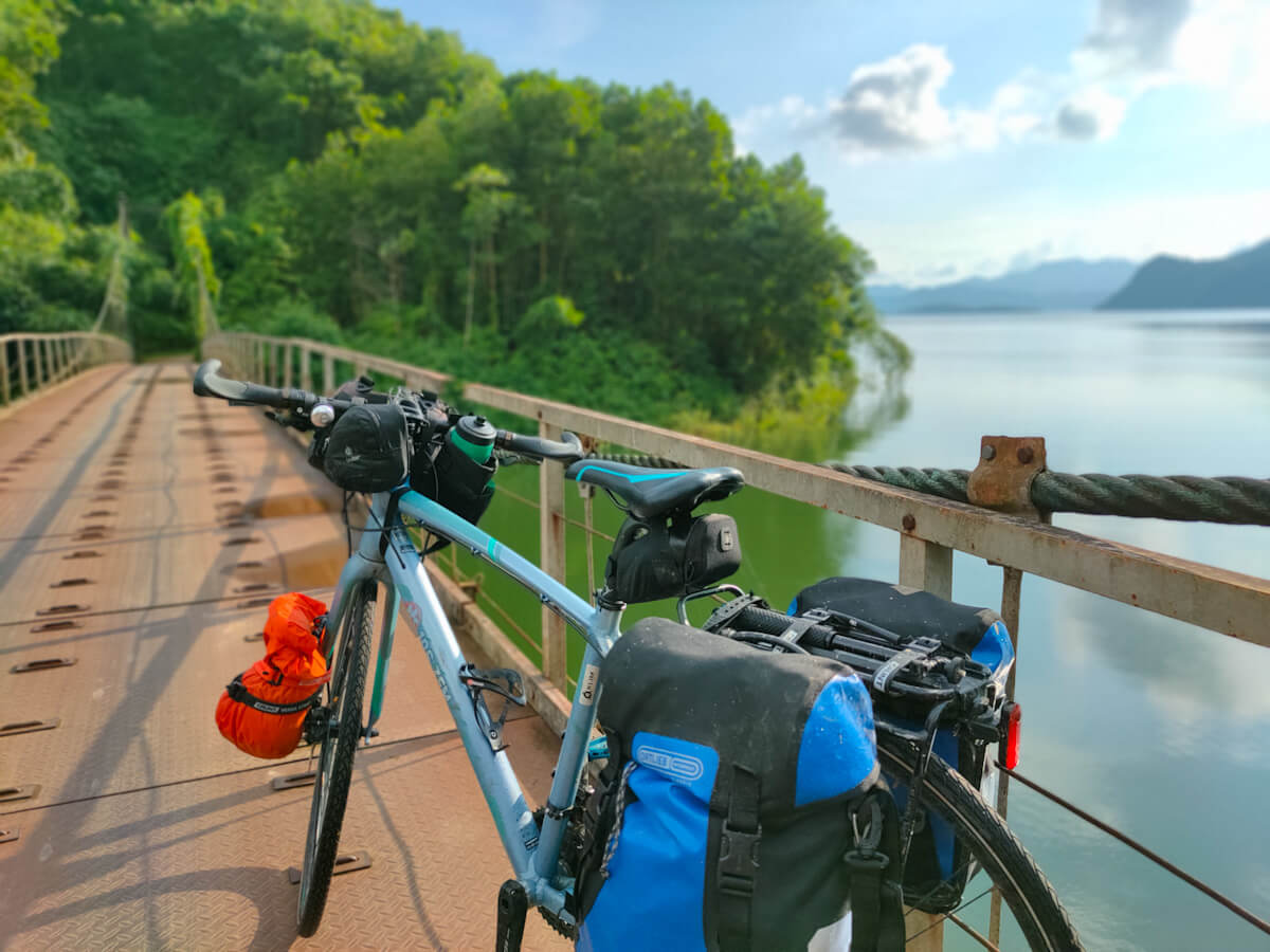 Bicycle crossing a bridge at Thac Ba Lake, Vietnam